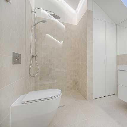 Modern bathroom remodel with new shower vanity and tile work