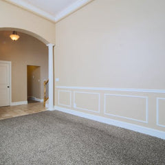 Dining room with crown molding and baseboard trim installed by Rocky Ridge Handyman in Broomfield Colorado