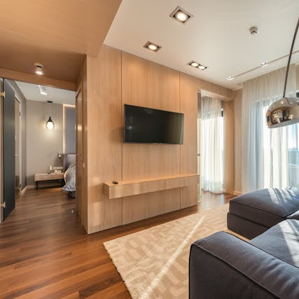 Wall mounted TV installation in modern living room in Westminster Colorado by Rocky Ridge Handyman