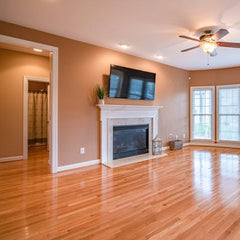 Flat screen TV professionally mounted above fireplace in Denver Colorado by Rocky Ridge Handyman